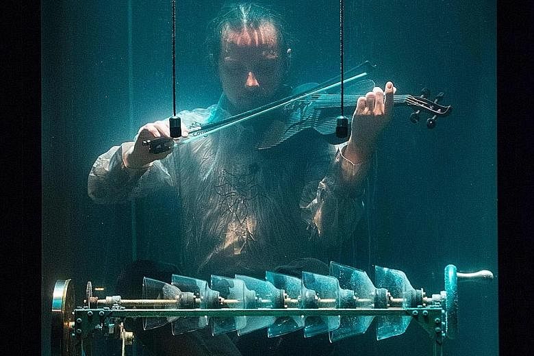 Five Danish musicians have bravely taken the plunge for the sake of their craft. The Between Music members descend into their own glass water tanks (above) with custom-made musical instruments for their latest project AquaSonic. Special microphones p