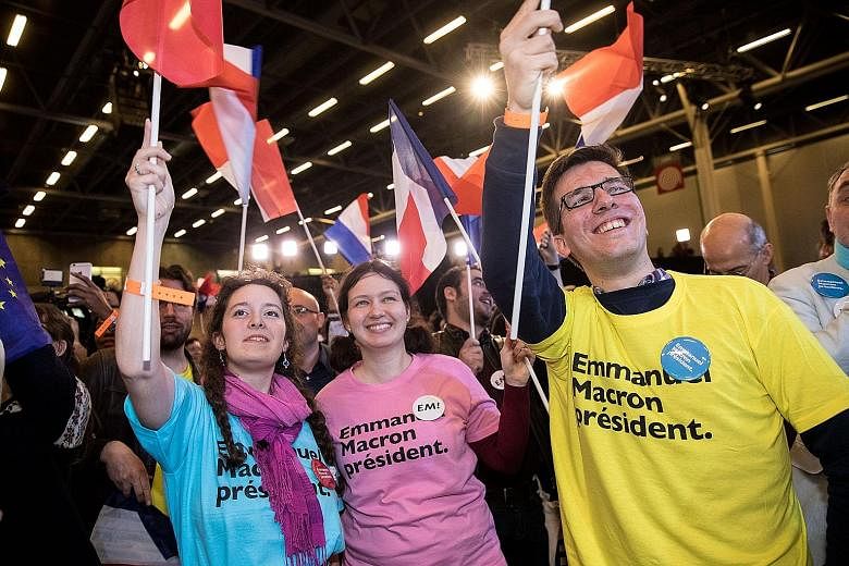 Supporters of Mr Emmanuel Macron and Ms Marine Le Pen at the En Marche! HQ (top right) and at a National Front party celebrating Sunday's results.