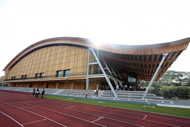 The Wave, NTU's new sports hall, is made mostly of mass engineered timber. The prefabrication of parts led to speedier construction and yielded a 25 per cent savings in labour.