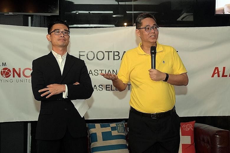 Individual candidates Sebastian Tan (left) and James Lim at a press conference yesterday, where they outlined their plans to improve Singapore football, should they be elected to the council at Saturday's FAS polls.