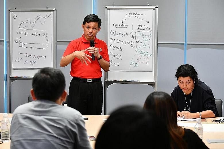 Mr Chan Chun Sing explaining to reporters at a media briefing yesterday how slower economic growth and changing patterns of employment mean the labour movement has to embrace a wider pool of workers beyond union members, to include PMEs, those in SME