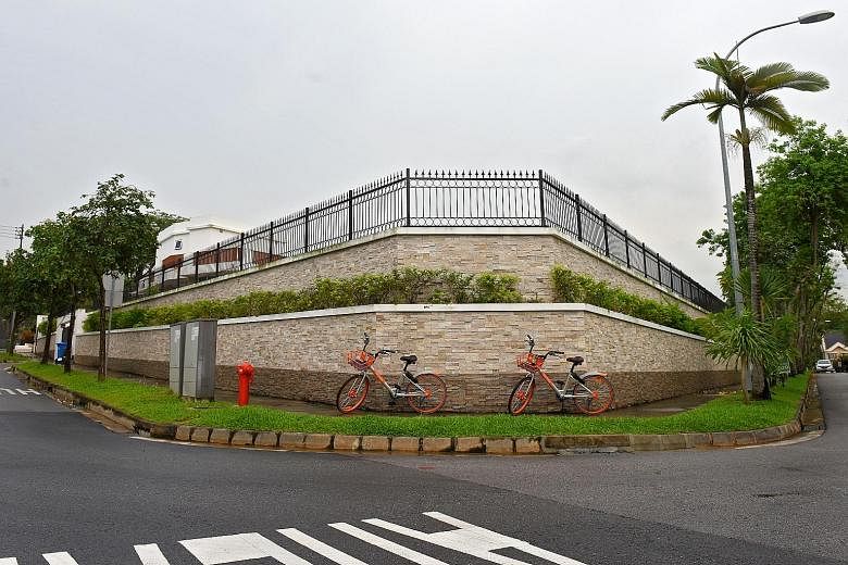 The two-tier wall surrounding Koh Wee Meng's house that sits at the junction of Toh Crescent and Toh Avenue.