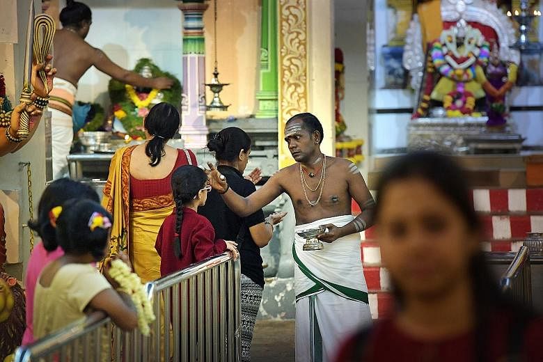 The 190-year-old Sri Mariamman Temple is popular with devotees and tourists alike, and is venerated by the local Hindu community. The main deity Mariamman (centre), who is believed to cure illnesses and epidemics, faces the entrance to the east, wher
