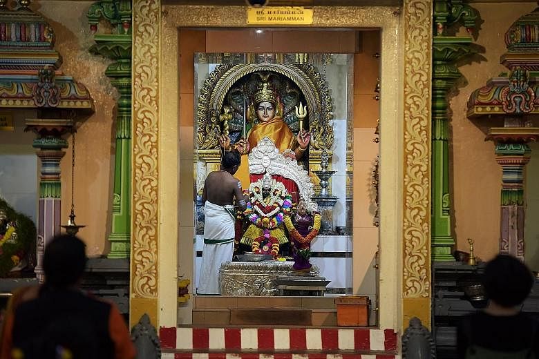 The 190-year-old Sri Mariamman Temple is popular with devotees and tourists alike, and is venerated by the local Hindu community. The main deity Mariamman (centre), who is believed to cure illnesses and epidemics, faces the entrance to the east, wher