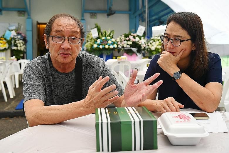 Mr Quek Chin Ling (above and far right) is too traumatised to drive after a freak accident killed his wife, Mrs Quek-Ng Siew Fong, on Tuesday night.