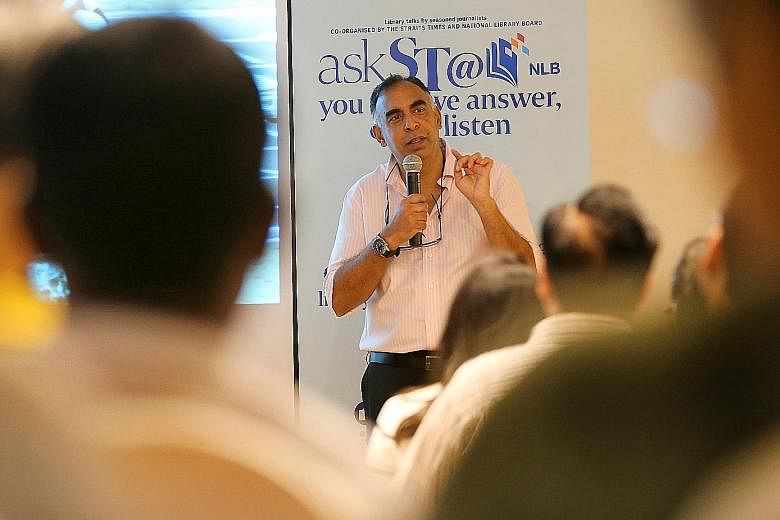 Mr Rohit Brijnath speaking at Library@Orchard yesterday in the final instalment of the year-long askST@NLB series. His talk, attended by 165 people, was peppered with stirring videos of athletes' accomplishments.