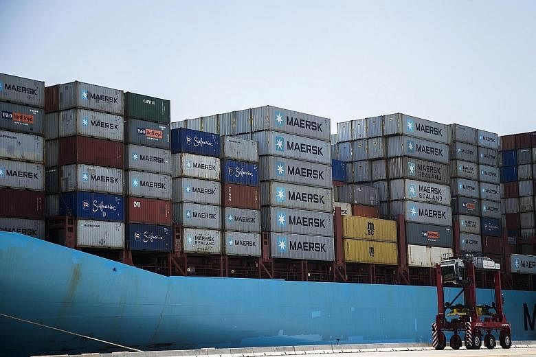 Container ship Caroline Maersk, docked at a Mexico terminal. The planned merger with Hamburg Sud will strengthen Maersk's trade presence in Latin America, where the German firm is well established.