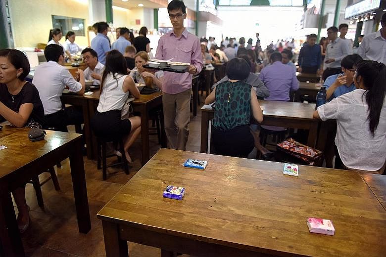 Although there are no restrictions on using items such as tissue paper to reserve seats in hawker centres, the National Environment Agency urged patrons to exercise consideration.
