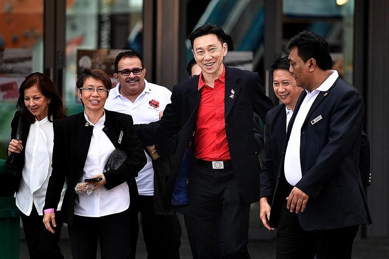 Mr Bill Ng (in red shirt) with (from left) vice-president nominees Annabel Pennefather and Teoh Chin Sim, supporters Suresh Nair and Francis Lee, and former national goalkeeper and council member nominee Shahri Rahim.
