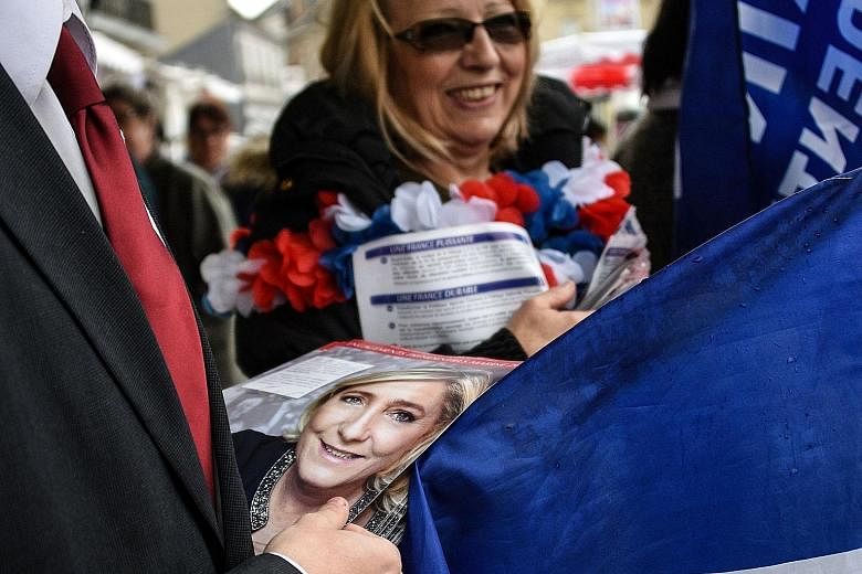 Supporters of Ms Marine Le Pen campaigning for the FN candidate ahead of the May 7 vote in the French presidential election.
