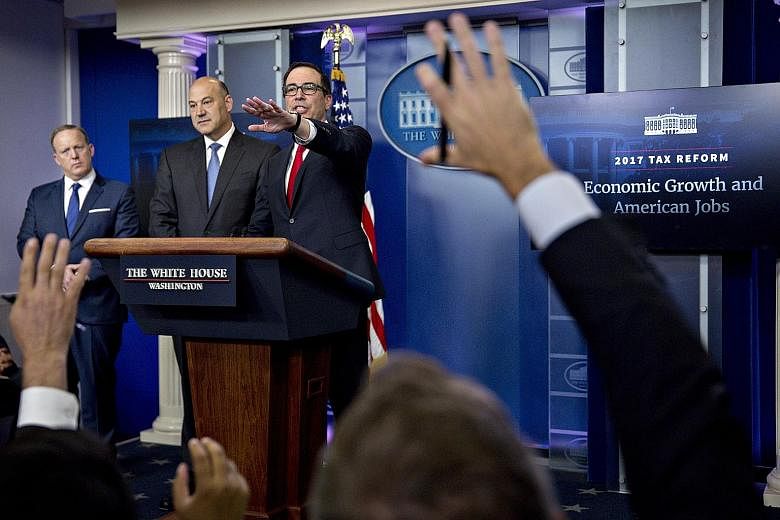 US Treasury Secretary Steven Mnuchin taking a question during last week's White House press briefing on President Donald Trump's tax-cut plan. The lack of details in the plan has added some uncertainties to the market.
