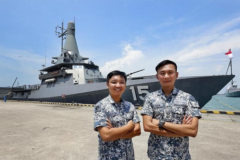 Lt-Col Tay Choong Hern (left), the commanding officer of the LMV Independence, and Lt-Col Chew Chun Chau, head of the LMV project office, with the soon-to-be-commissioned vessel at Changi Naval Base last Friday.