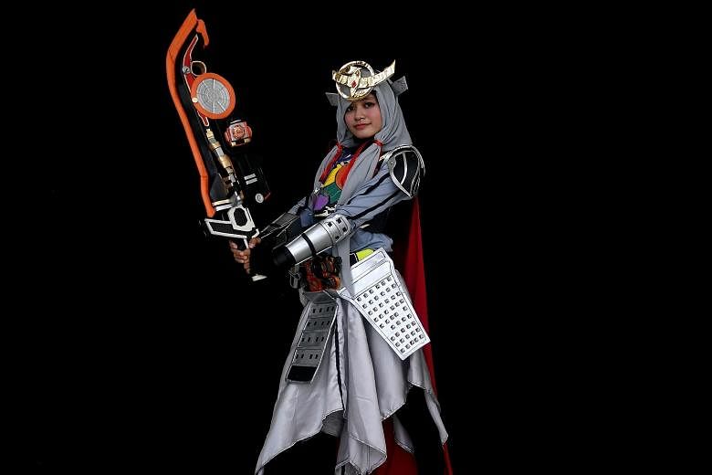 Ange, a young Indonesian Muslim cosplayer, is dressed as the Kamen rider Gaim.