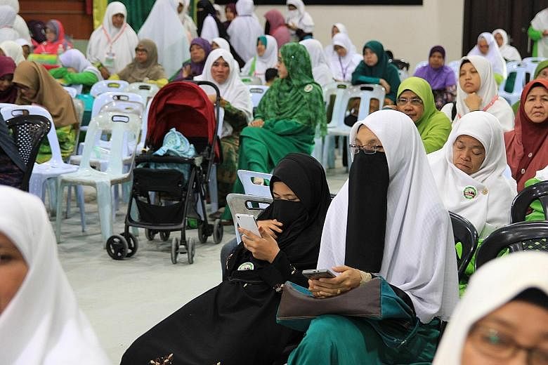 Women attending the annual PAS congress in Alor Setar last week could be spotted wearing face veils in addition to the now standard headscarves. Despite rising conservatism among Muslims in Malaysia, it is still unusual to see women in niqab on the s