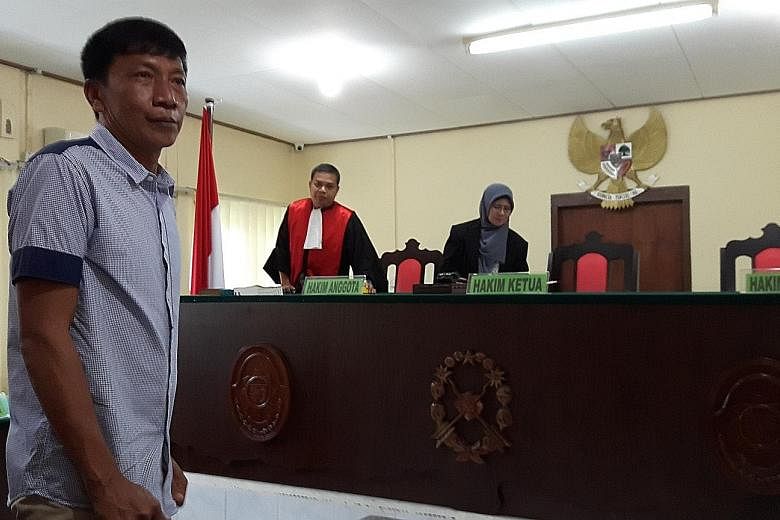 Above: Shoo Chiau Huat at a court hearing in Tanjung Pinang last October. A prosecution appeal against his acquittal for illegal fishing is still pending. Left: Mr Ricky Tan Poh Hui was released from the Tanjung Pinang Naval Base on Tuesday after he 