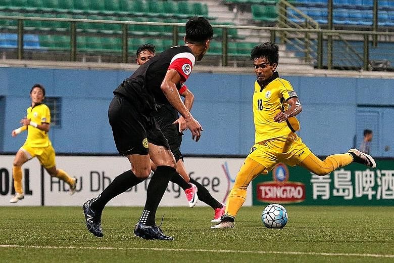 Tampines Rovers midfielder Yasir Hanapi attempts a shot against Ceres Negros in their final AFC Cup Group G match last night at Jalan Besar Stadium. Despite his goals in the 24th and 60th minutes, the hosts, who were reduced to 10 men when Shakir Ham