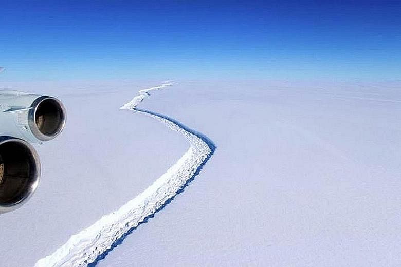 An aerial view of the rift in the Larsen C ice shelf. Ice shelves serve as a kind of stopper at the edges of glaciers, stabilising all the ice behind them. When they break, they have the potential to unleash a flood of ice from the continent that can