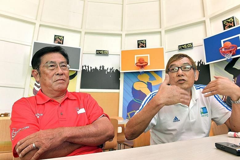 Singapore Athletics (SA) president Ho Mun Cheong (right) telling reporters at a press conference that infighting must stop at SA. He was joined by vice-president Loh Chan Pew.