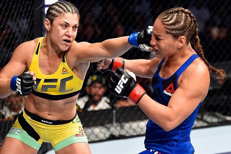 Bantamweight Bethe Correia of Brazil (left) attacking Marion Reneau of the United States during their drawn bout at UFC Fight Night 106 in March this year. She acknowledges that her next opponent, Holly Holm, is a "good fighter" but has weaknesses th