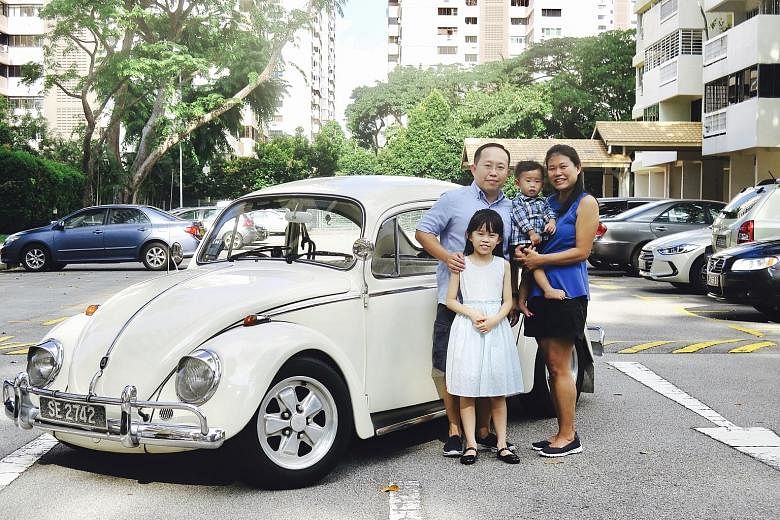 Mr Ong Ai Chuan and Madam Lim Geok Choon (carrying son Yan Jie) intend to hand the 1971 Volkswagen Beetle to their daughter Yan Qi when the time comes.