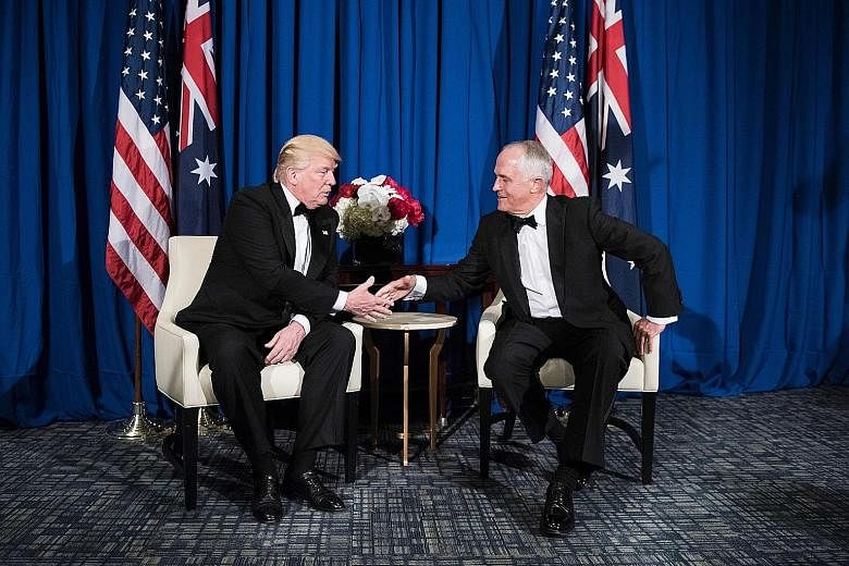 US President Donald Trump and Australian Prime Minister Malcolm Turnbull at their meeting on Thursday aboard the decommissioned carrier Intrepid, now a museum docked in the Hudson River, to mark the 75th anniversary of the victory of the US and Austr