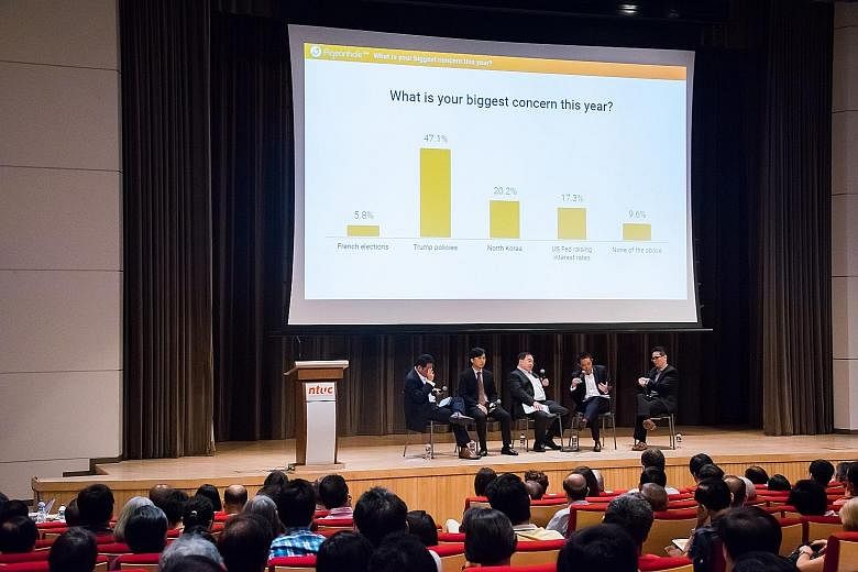 Panellists from CFA Society Singapore - (from left) Mr Daryl Liew, Mr Jack Wang, Mr Phoon Chiong Tuck, Mr Simon Ng and Mr Chua I-Min - at the April 22 seminar, which is part of the Save & Invest Portfolio Series. They say a big crash in equity market