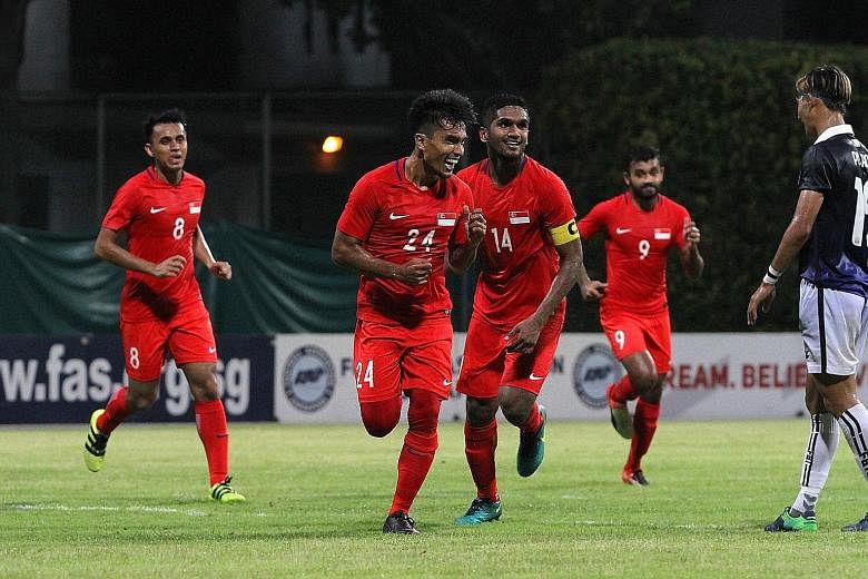 Yasir Hanapi (No. 24) celebrating after scoring for the Lions. The team are ranked 160th in the world and this is the time to look to the future by unearthing a new generation of players.