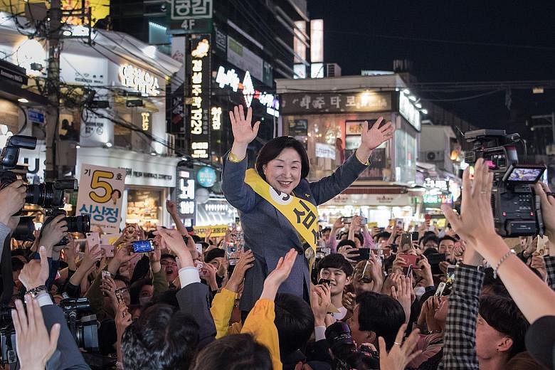 Ms Sim Sang Jeung at a campaign rally in Seoul on Saturday. She is a former labour activist who is the leftwing Justice Party's candidate and is up against 12 men in the presidential race.