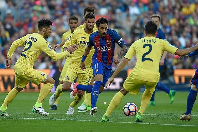 Weaving a path past his opponents, Barcelona's Neymar played a vital role in his side's 4-1 win against Villarreal to keep title rivals Real Madrid on their toes.