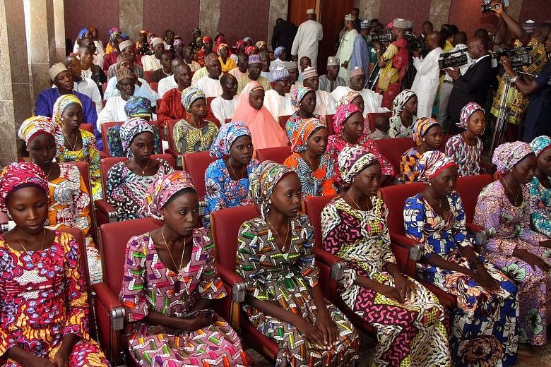 A group of girls from Chibok village who were released by Boko Haram last October. Even with the dozens released on Saturday, over 100 girls are still believed to be held by the militant group, with many possibly married to fighters or forced to beco
