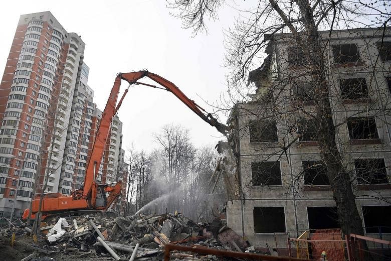 An apartment block in Moscow being demolished last month. Moscow's mayor wants to knock down low-rise housing, focusing on the five-storey buildings thrown up under Soviet leader Nikita Khrushchev in the 1950s and 60s. But the programme has prompted 