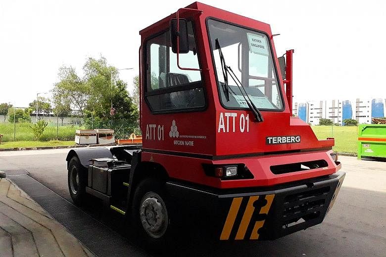 The trucks, retrofitted with autonomous technology, are activated by communicating with transponders in the road.