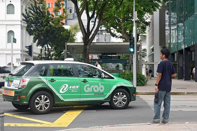 While some cabbies have voiced concerns about the lower fares from services such as JustGrab and GrabShare, others have welcomed the new technology.
