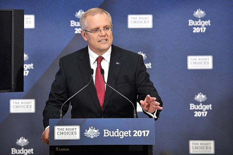 Treasurer Scott Morrison touts the Budget as an "honest" one that "does not pretend to do things with money we do not have".