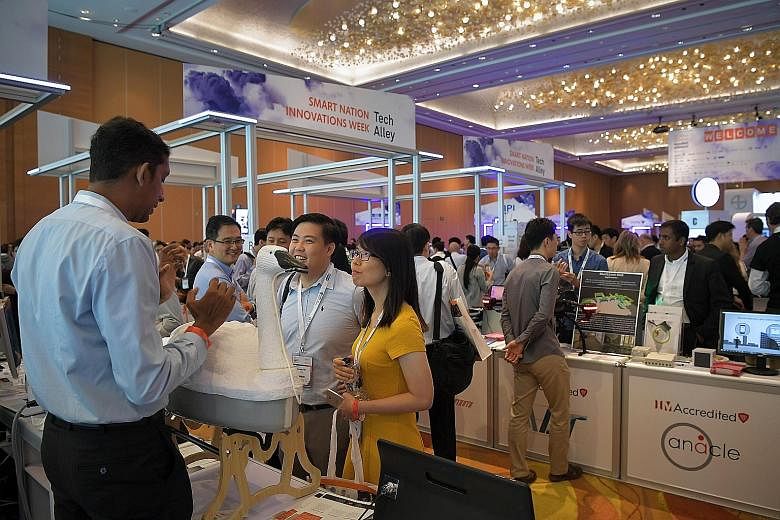 The crowd at the InnovFest Unbound Tech Fair at Marina Bay Sands Convention Centre last week. The National Research Foundation announced the setting up of AI.SG, a $150 million multi-agency effort that aims to tackle and solve national problems in he