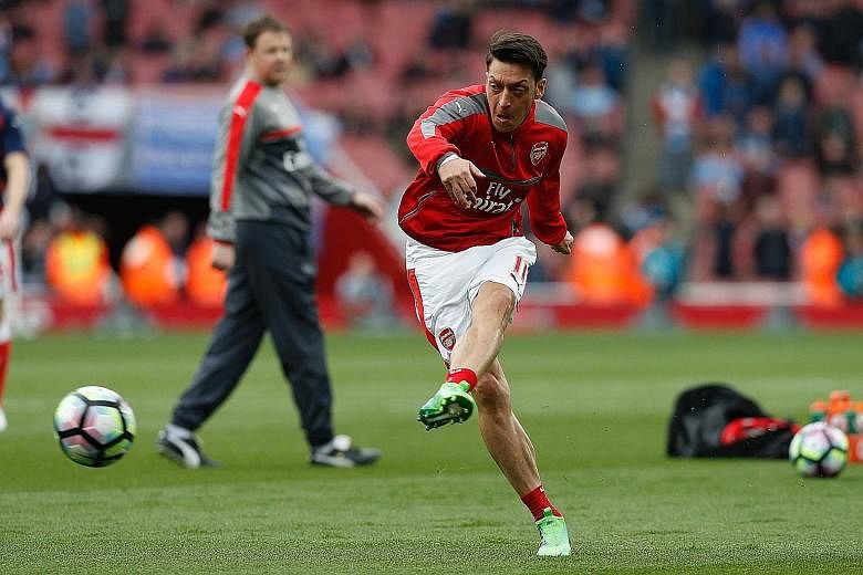Arsenal forward Mesut Ozil is likely to feature against Southampton today in the Gunners' bid for a top-four finish.