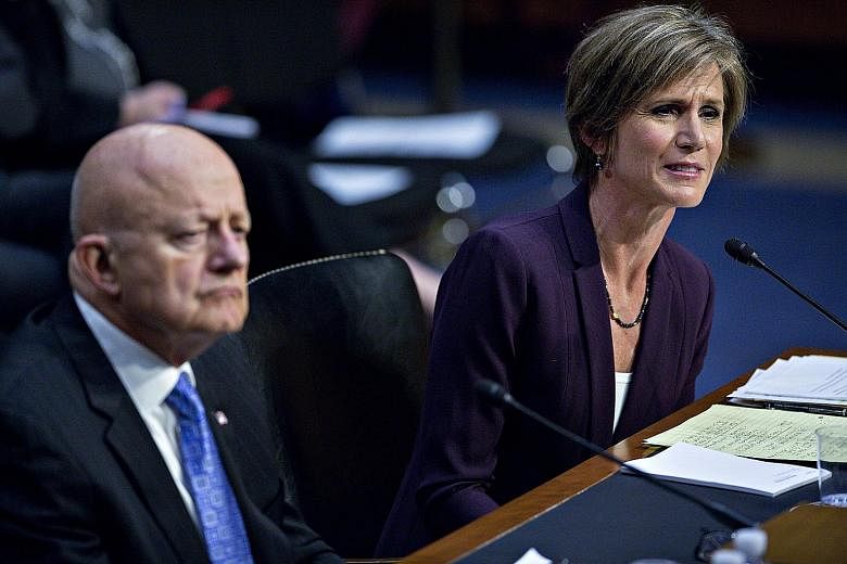 Ms Sally Yates with Mr James Clapper during a Senate Judiciary Subcommittee on Crime and Terrorism hearing in Washington on Monday.