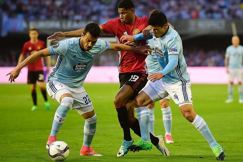 Manchester United striker Marcus Rashford taking on Celta Vigo's Gustavo Cabral (left) and Facundo Roncaglia during the first leg of their Europa League semi-final on May 4. Rashford scored the only goal of the match with a memorable free kick in the