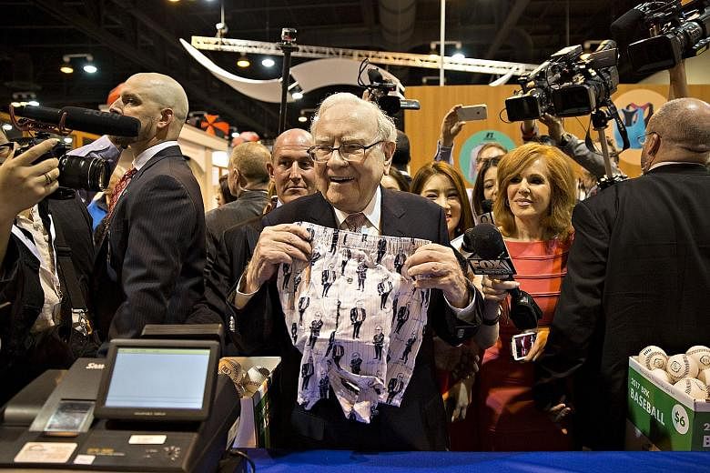 Berkshire chief Warren Buffett with a pair of boxer shorts bearing a likeness of himself ahead of the company's annual meeting last Saturday. The billionaire investor's recent list of takeover targets seems equally short.