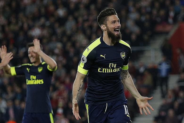 Arsenal's Olivier Giroud celebrates scoring their second goal to seal the 2-0 win over Southampton. It was the Frenchman's 10th goal of the season, helping the Gunners to a fourth win in their last five games.