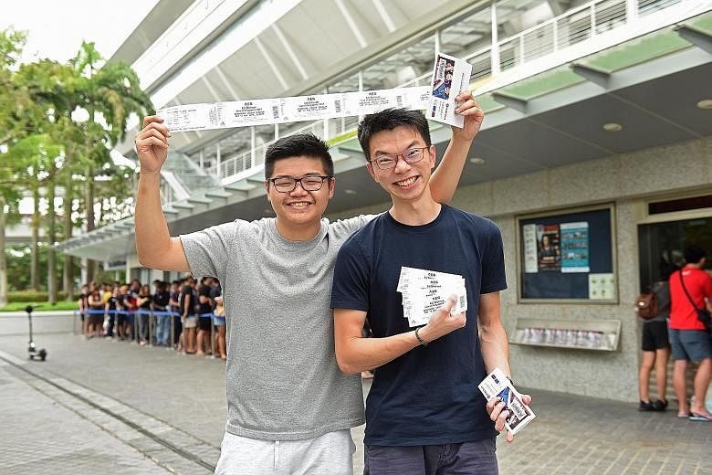 Friends Ong Sean and John Choo, both 21, were among the first to get their hands on English singer Ed Sheeran's concert tickets at the Singapore Indoor Stadium box office yesterday. The overnight queue was expected. So was the appearance of scalpers 
