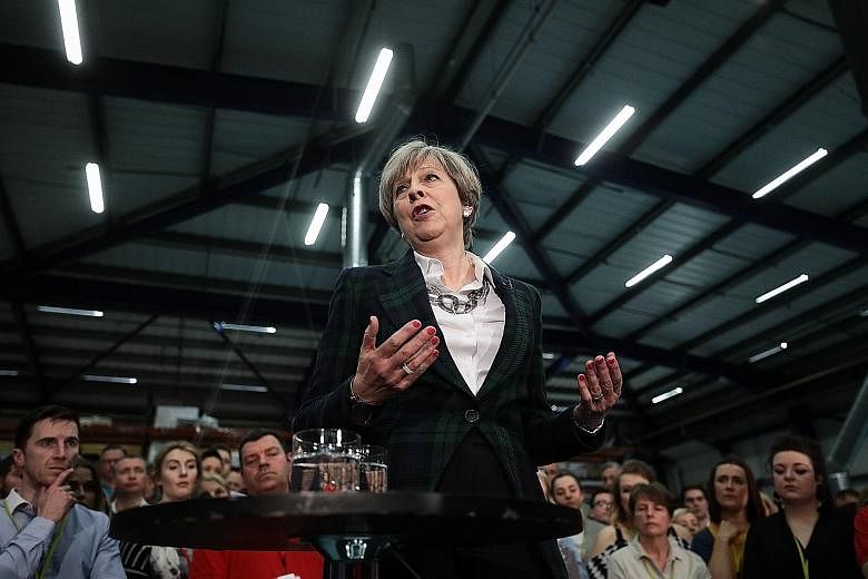 British Prime Minister Theresa May speaking at an election campaign event in Mansfield on Wednesday. She said in an e-mail statement that her party will ensure that the armed forces will be well equipped with the resources needed to keep the country 