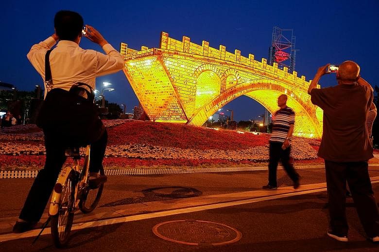 The Golden Bridge On Silk Road installation by artist Shu Yong, set up ahead of the Belt and Road Forum in Beijing. The summit is aimed at easing concerns about China's rise and boosting President Xi Jinping's profile at home, where he has become the
