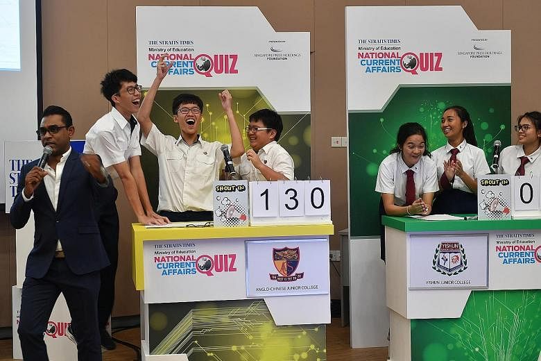 ACJC team members (from left) Hoo Jia Kai, 17, Teh Ren Jie, 18, and Su Pei Geng, 17, celebrating their victory beside the Yishun JC team. The team had trailed Eunoia JC and NUS High School of Mathematics and Science until the last question. Quiz mast