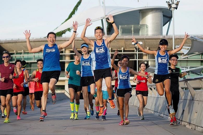 Runners enjoying the first training session for The Straits Times Run in the City last year. Running as part of a group means an athlete can take advantage of the collective synergy created by the presence of others.