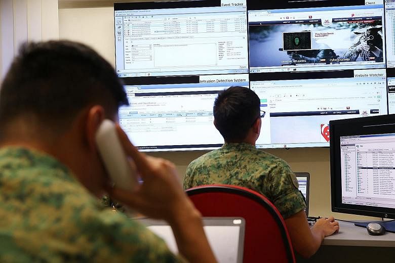 A simulated cyber attack at the Cyber Test and Evaluation Centre. The SAF has to nurture "institutional mavericks" capable of tackling entrenched barriers to military innovation, the writer says.