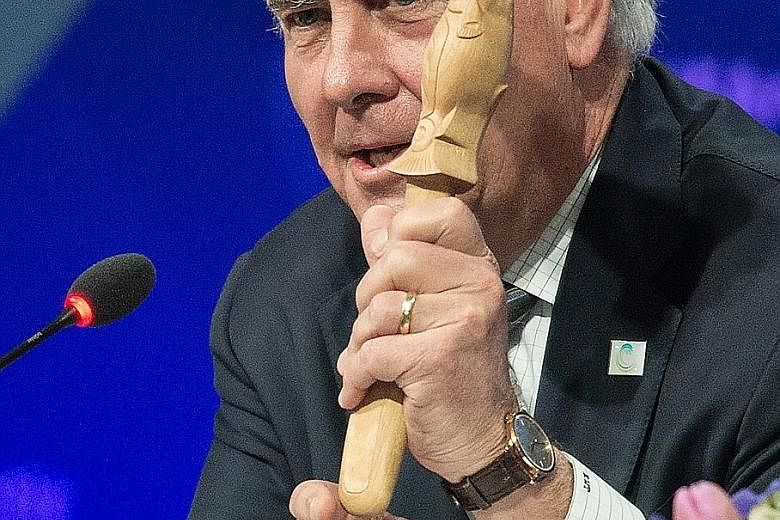 US Secretary of State Rex Tillerson with the gavel of the Arctic Council chair at its meeting in Alaska on Thursday. The council meets every two years to tackle climate change and other issues facing the North.