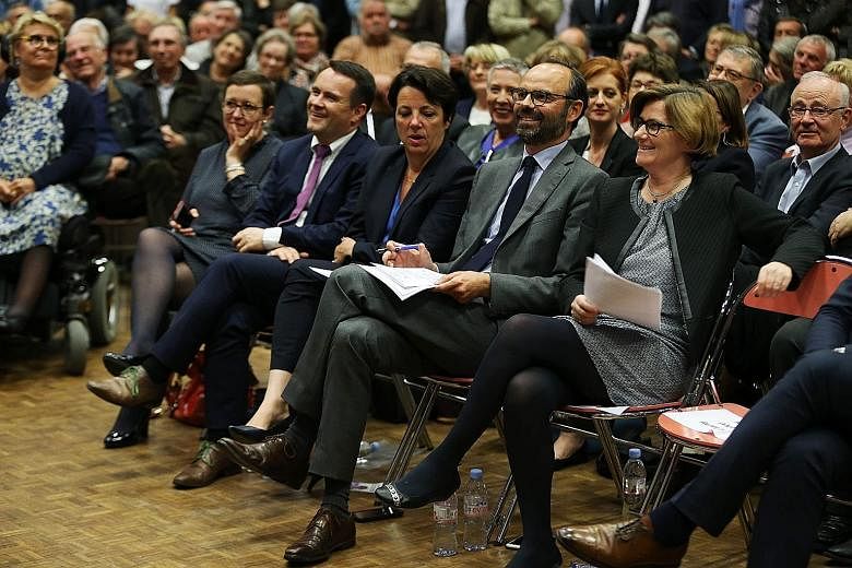 Le Havre Mayor Edouard Philippe (second from right) preparing to present candidates for the Republic on the Move party on Thursday, ahead of the parliamentary elections in June.