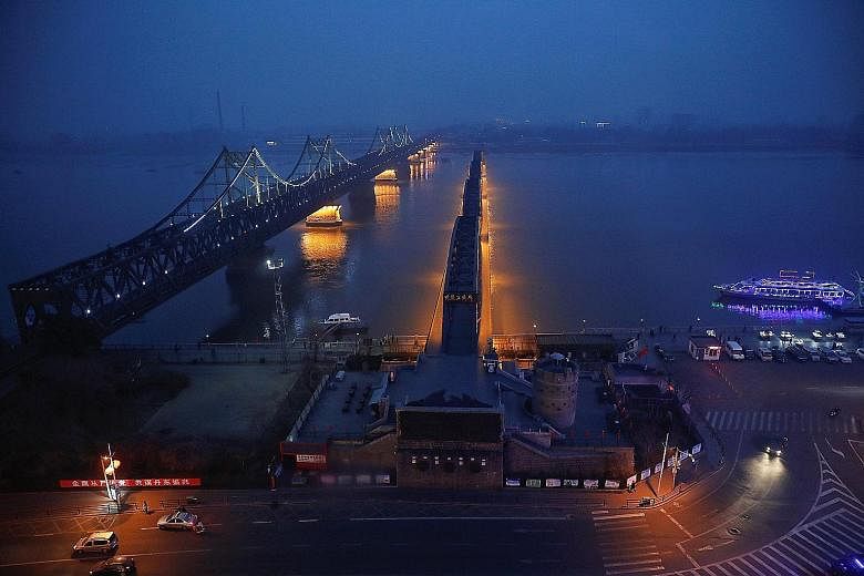 A view of the Friendship and Broken bridges that link Dandong in China to the North Korean border town of Sinuiju across the Yalu River. China has a long record of shielding North Korea from more painful sanctions because it is afraid of a regime col