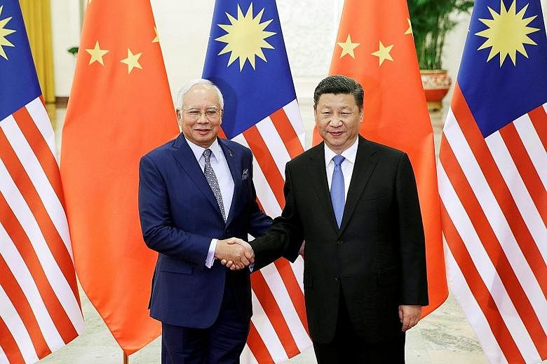 Malaysian Premier Najib Razak met Chinese President Xi Jinping in Beijing yesterday ahead of a forum on the Belt and Road project.
